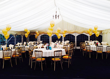 Venue dressing with latex balloon bunches