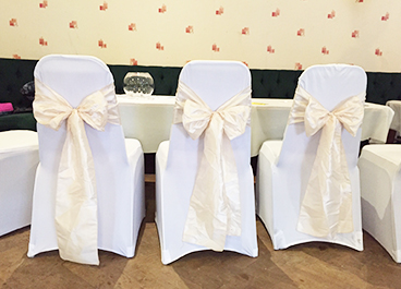 Chair covers with bows